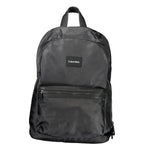 Black Calvin Klein men's backpack made of polyester with adjustable straps and multiple compartments.