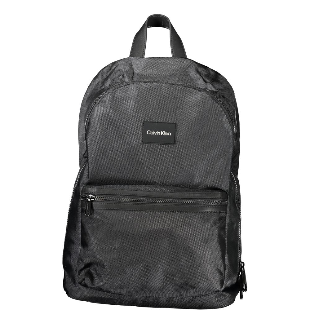 Black Calvin Klein men's backpack made of polyester with adjustable straps and multiple compartments.