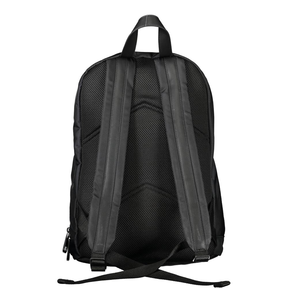 Black Calvin Klein men's polyester backpack with adjustable straps and multiple compartments, ideal for everyday use.