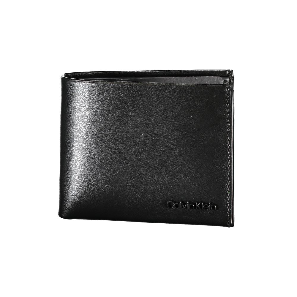 Black Calvin Klein men's shoulder bag made of polyester, featuring a sleek design with adjustable strap and subtle branding.