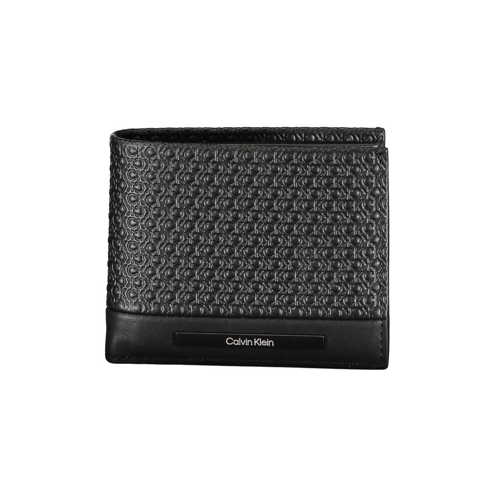 Black Calvin Klein women's shoulder bag made of polyester with sleek design and adjustable strap.