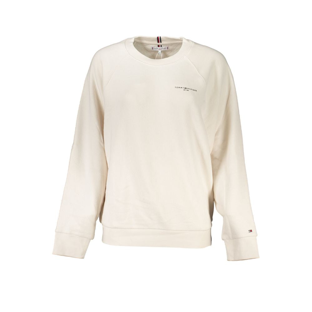 Beige cotton women's sweatshirt by Tommy Hilfiger with crew neckline and relaxed fit, displayed on a hanger.