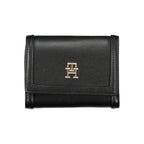 Tommy Hilfiger black polyurethane women’s wallet with multiple card slots and a sleek design.