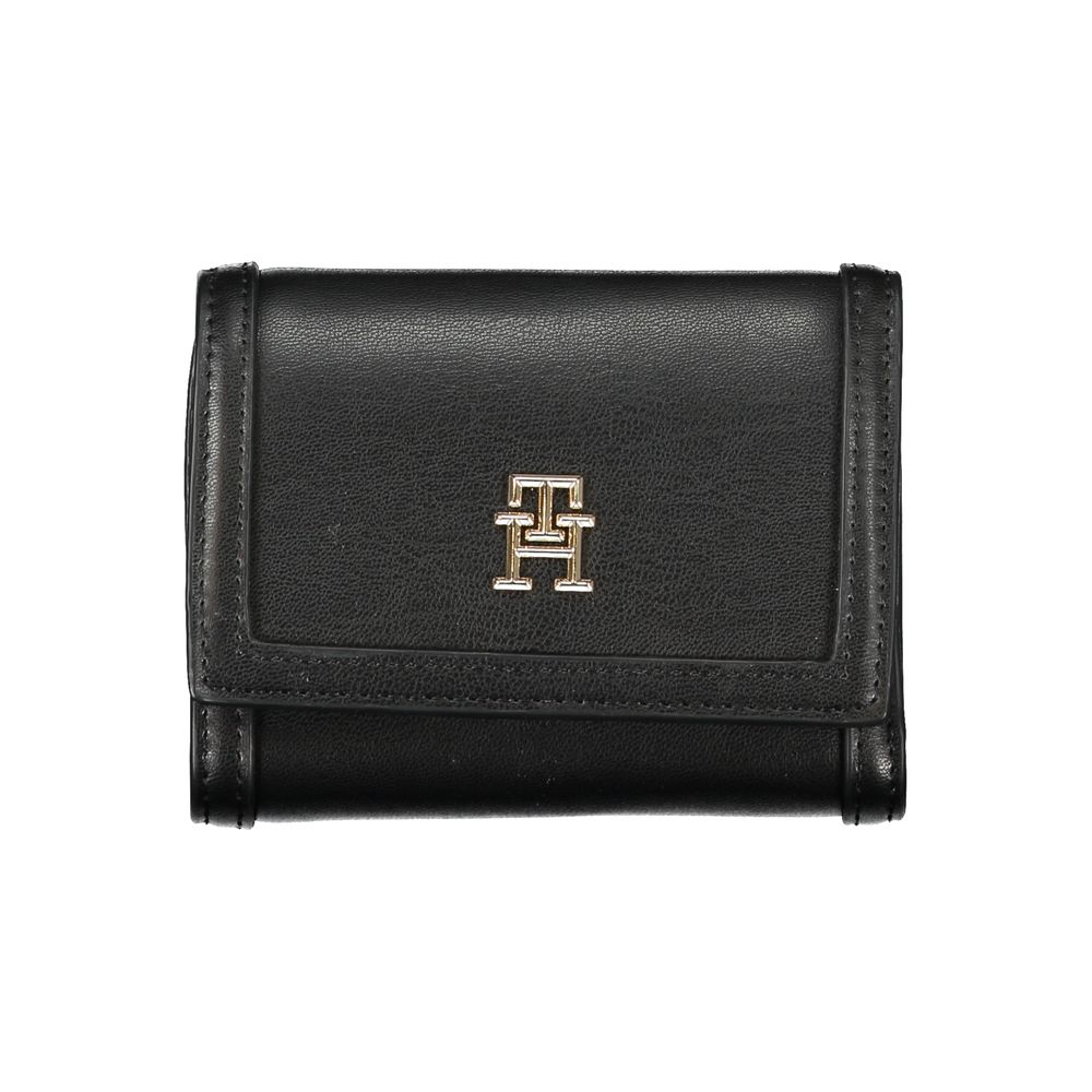 Tommy Hilfiger black polyurethane women’s wallet with multiple card slots and a sleek design.