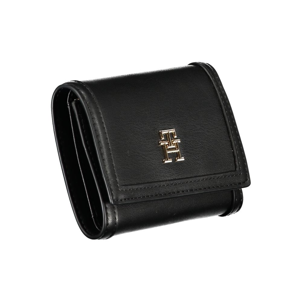 Tommy Hilfiger black polyurethane women’s wallet with multiple card slots and a sleek, stylish design.