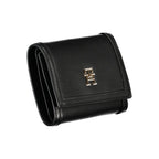 Tommy Hilfiger black polyurethane women’s wallet with multiple card slots and a sleek, stylish design.