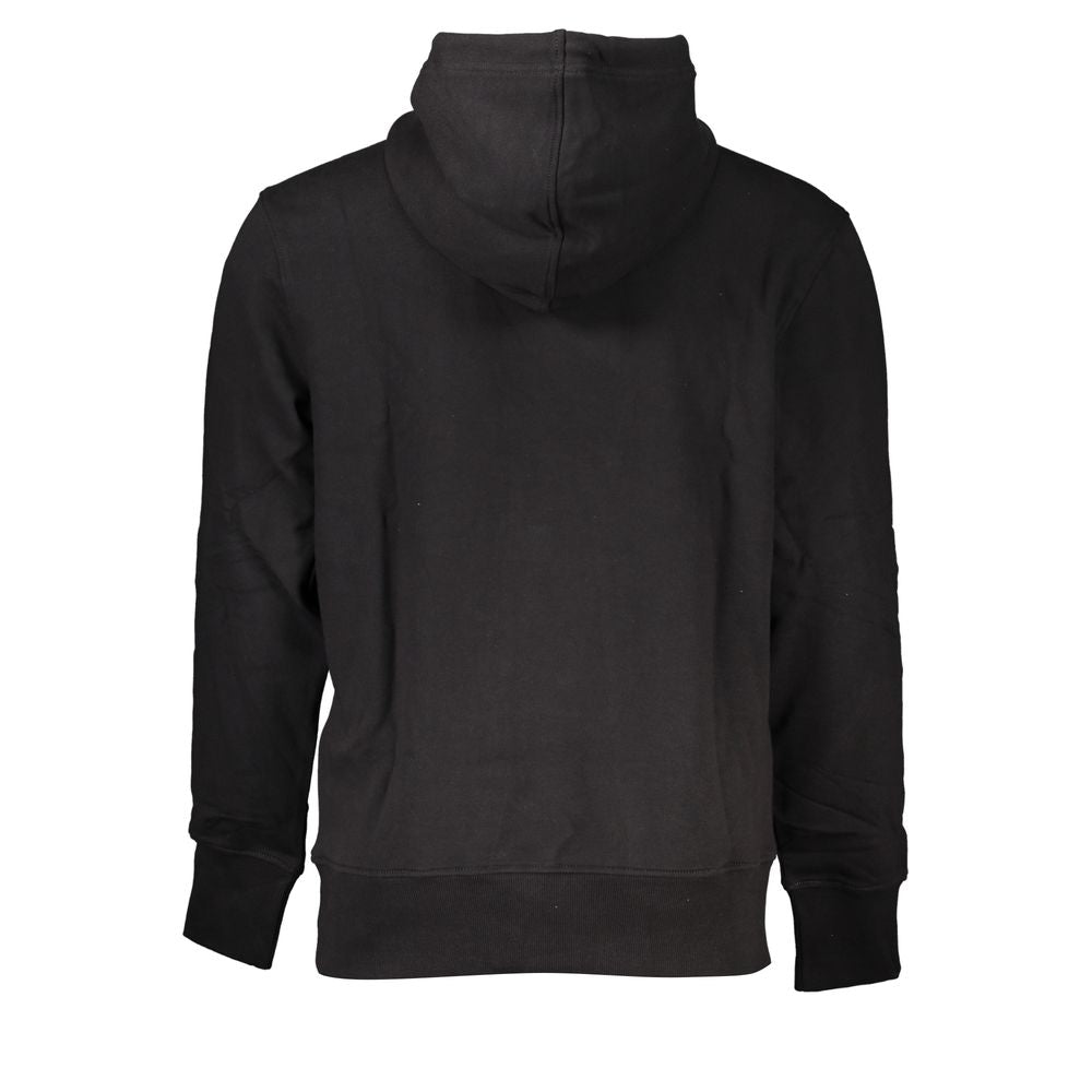 Black cotton men's sweater by Calvin Klein with a crew neck and ribbed cuffs, displayed on a hanger.