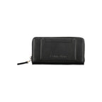 Black Calvin Klein polyester women's wallet with multiple card slots and zipper closure, designed for everyday use.
