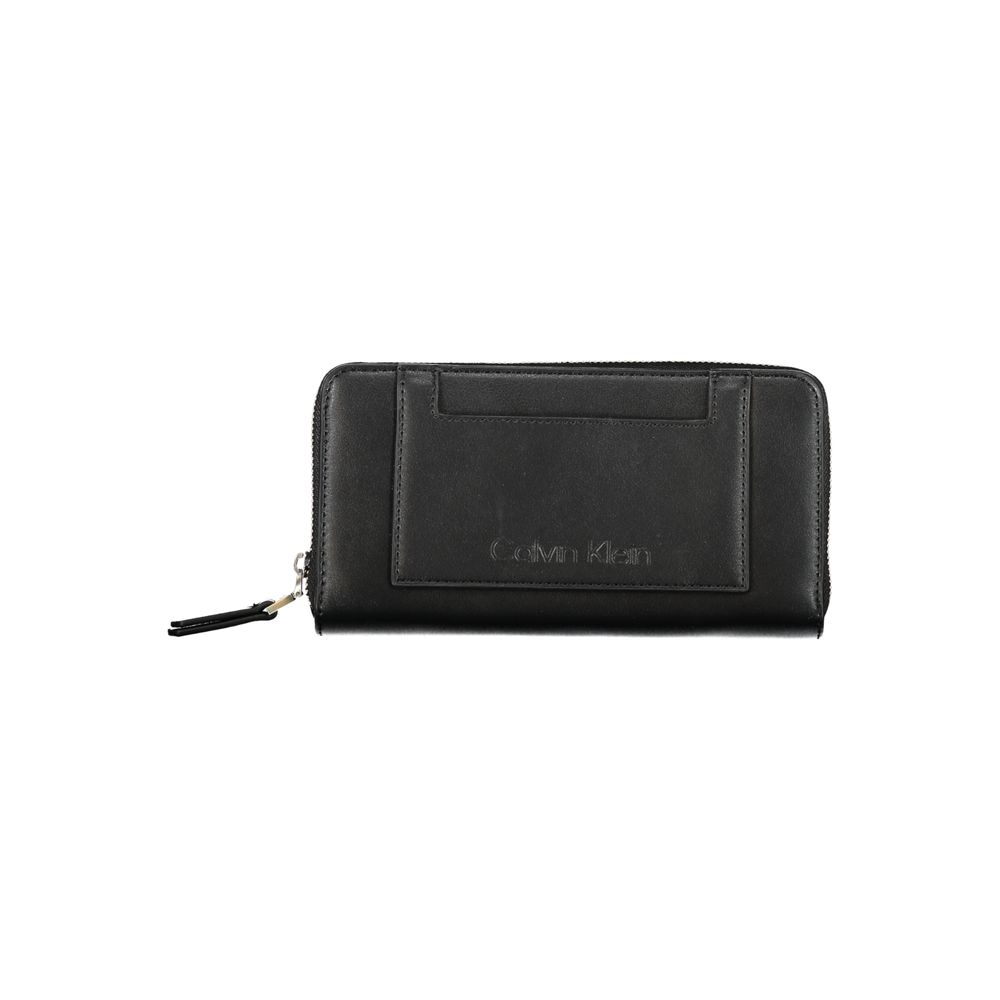 Black Calvin Klein polyester women's wallet with multiple card slots and zipper closure, designed for everyday use.