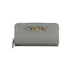 Tommy Hilfiger women's Grigio poliuretano wallet with zip closure and brand logo, featuring a sleek gray design.