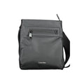 Black Calvin Klein men's shoulder bag made of polyester with adjustable strap and sleek design.