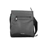 Black Calvin Klein men's shoulder bag made of polyester with adjustable strap and sleek design.
