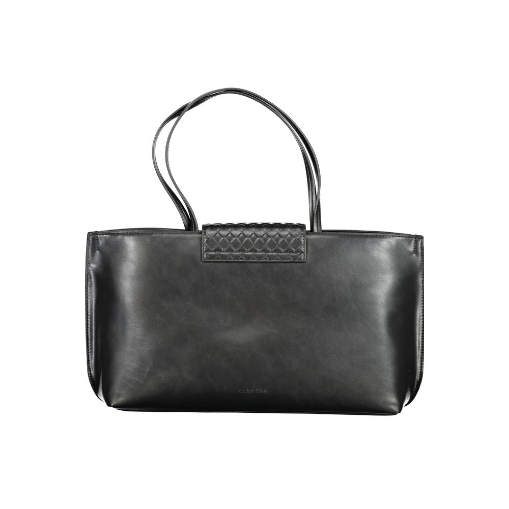 Calvin Klein black polyester women's handbag with sleek design and silver hardware, stylish accessory for everyday use.