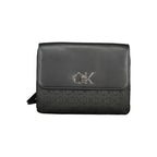 Black polyester women's handbag by Calvin Klein with sleek design and subtle logo detailing.