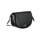 Black Calvin Klein polyurethane shoulder bag for women with sleek design and adjustable strap, stylish accessory.
