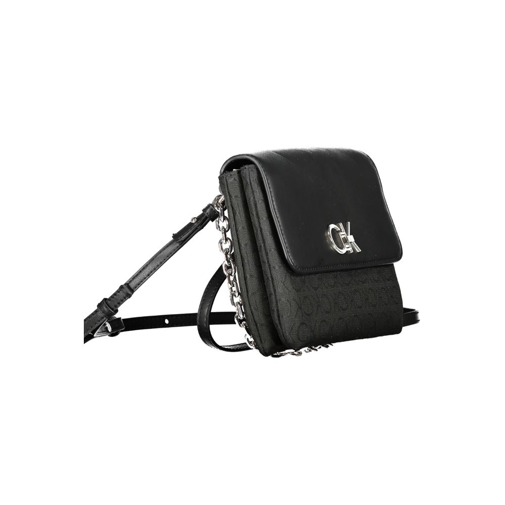 Black polyester Calvin Klein women's handbag with sleek design and subtle logo detailing.