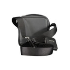 Calvin Klein black polyurethane men's shoulder bag with adjustable strap and sleek design, perfect for everyday use.