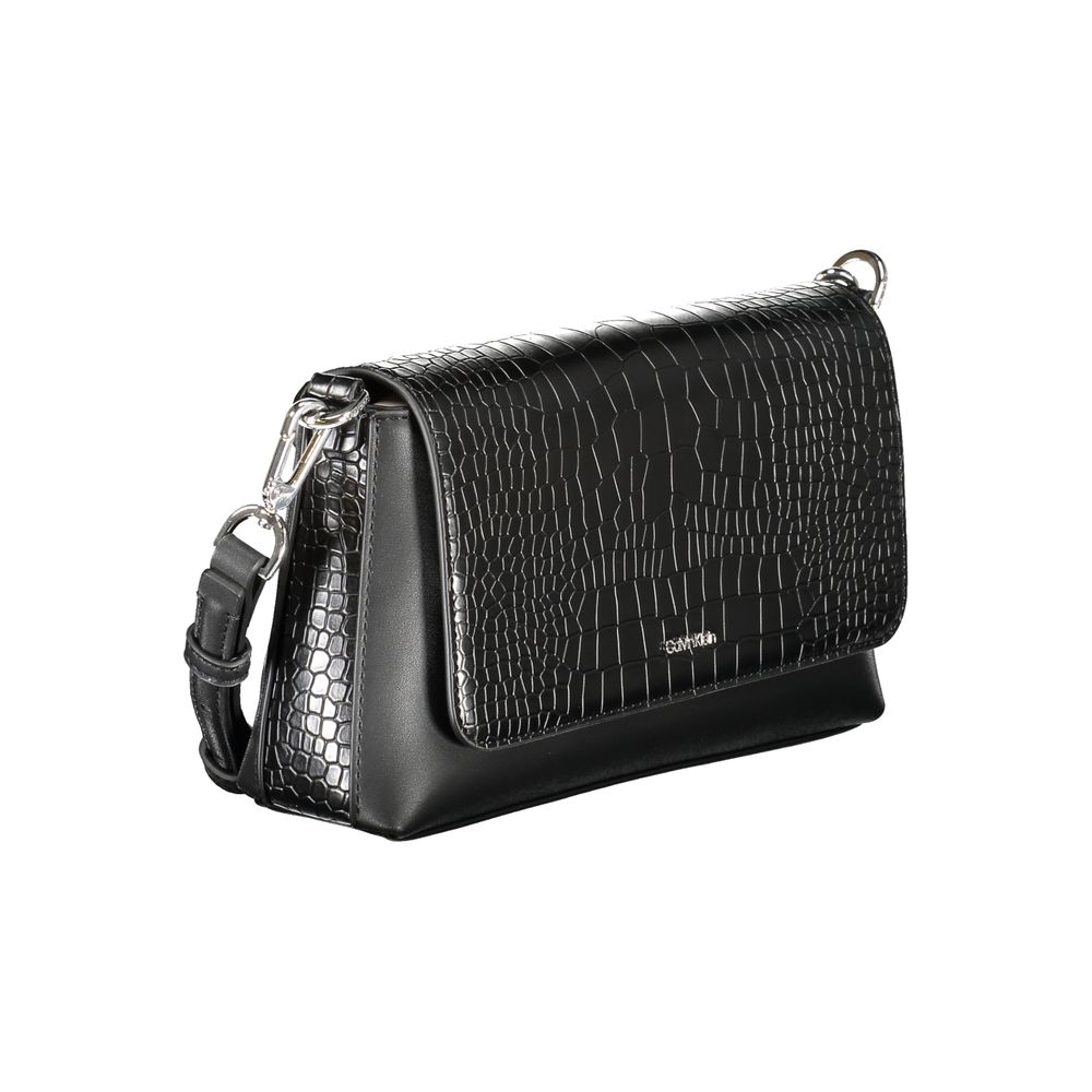 Calvin Klein black polyurethane women's handbag with sleek design and silver hardware, stylish accessory for everyday use.