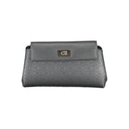 Calvin Klein black polyester women's shoulder bag with sleek design and adjustable strap, perfect for casual and everyday use.