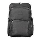 Black polyester men's backpack by Calvin Klein with adjustable straps and multiple compartments.