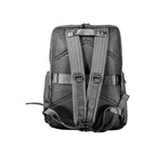 Calvin Klein black polyester men's backpack with adjustable straps and multiple compartments for everyday use.