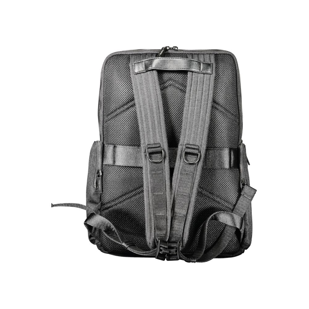 Calvin Klein black polyester men's backpack with adjustable straps and multiple compartments for everyday use.