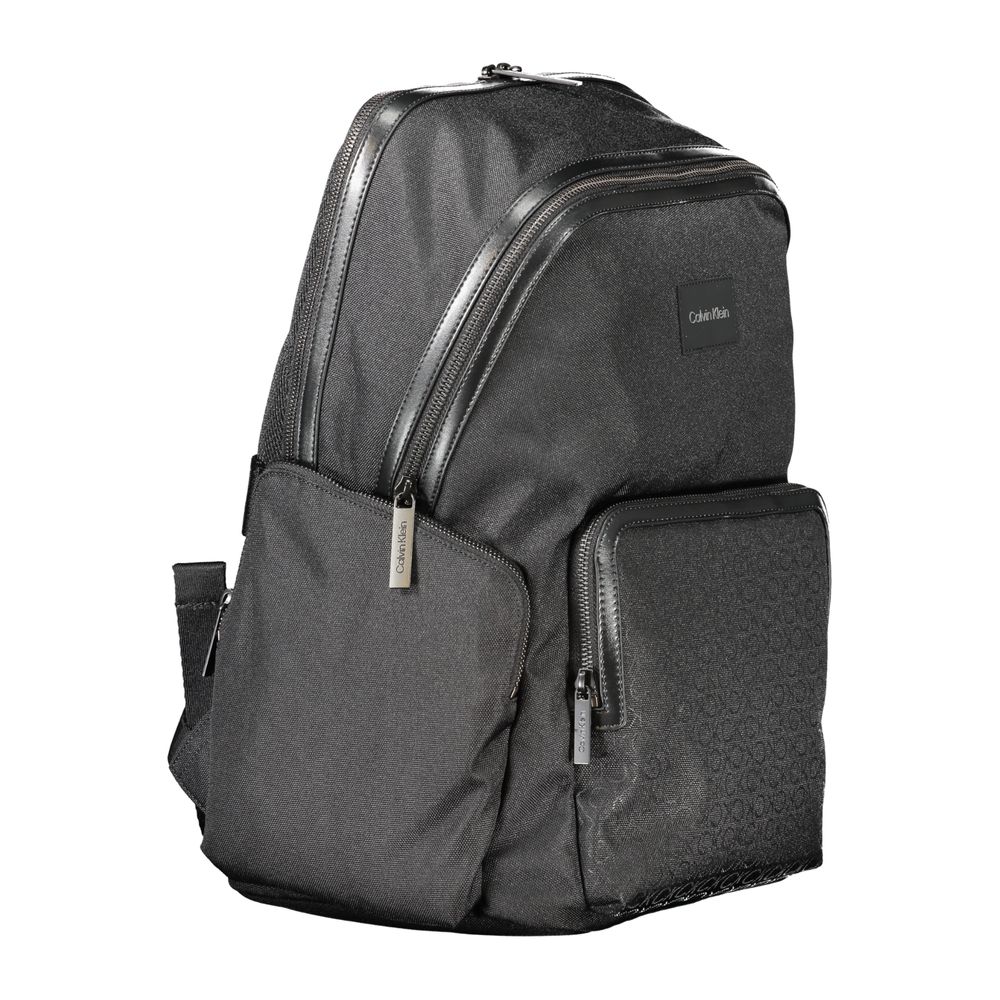 Calvin Klein black polyester men's backpack with multiple compartments and adjustable straps, stylish and functional for everyday use.
