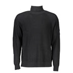 Calvin Klein black wool men's sweater with ribbed cuffs and neckline, displayed on a neutral background.