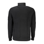 Black wool men's sweater by Calvin Klein featuring a classic crew neck and ribbed cuffs, styled on a plain background.