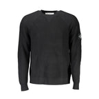 Calvin Klein Nero wool men's sweater displayed on a mannequin, featuring a classic crew neck and ribbed cuffs.