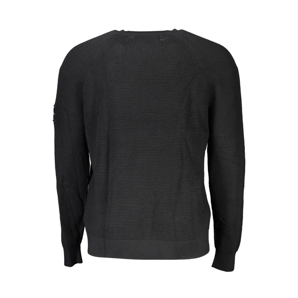 Calvin Klein Nero Wool men's sweater featuring a classic crew neck and long sleeves, made from soft wool fabric.