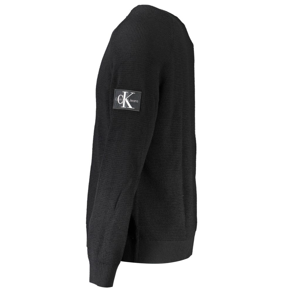 Calvin Klein men's Nero wool sweater featuring a classic crew neck and ribbed cuffs, stylish and warm for everyday wear.