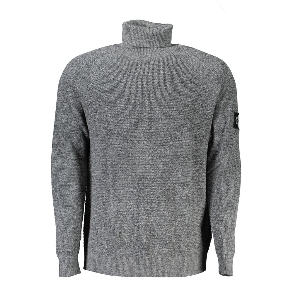Calvin Klein Grigio wool men's sweater displayed on a hanger, showcasing a classic crew neck design and textured knit fabric.