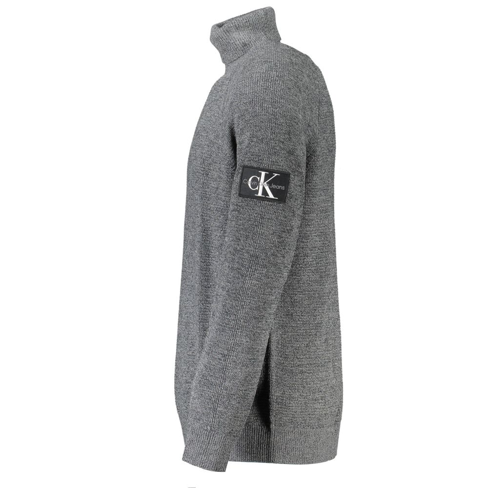 Calvin Klein Grigio Wool Men's Sweater showing a close-up of the heather gray knit fabric and ribbed cuffs.
