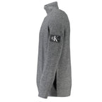 Calvin Klein Grigio Wool Men's Sweater showing a close-up of the heather gray knit fabric and ribbed cuffs.