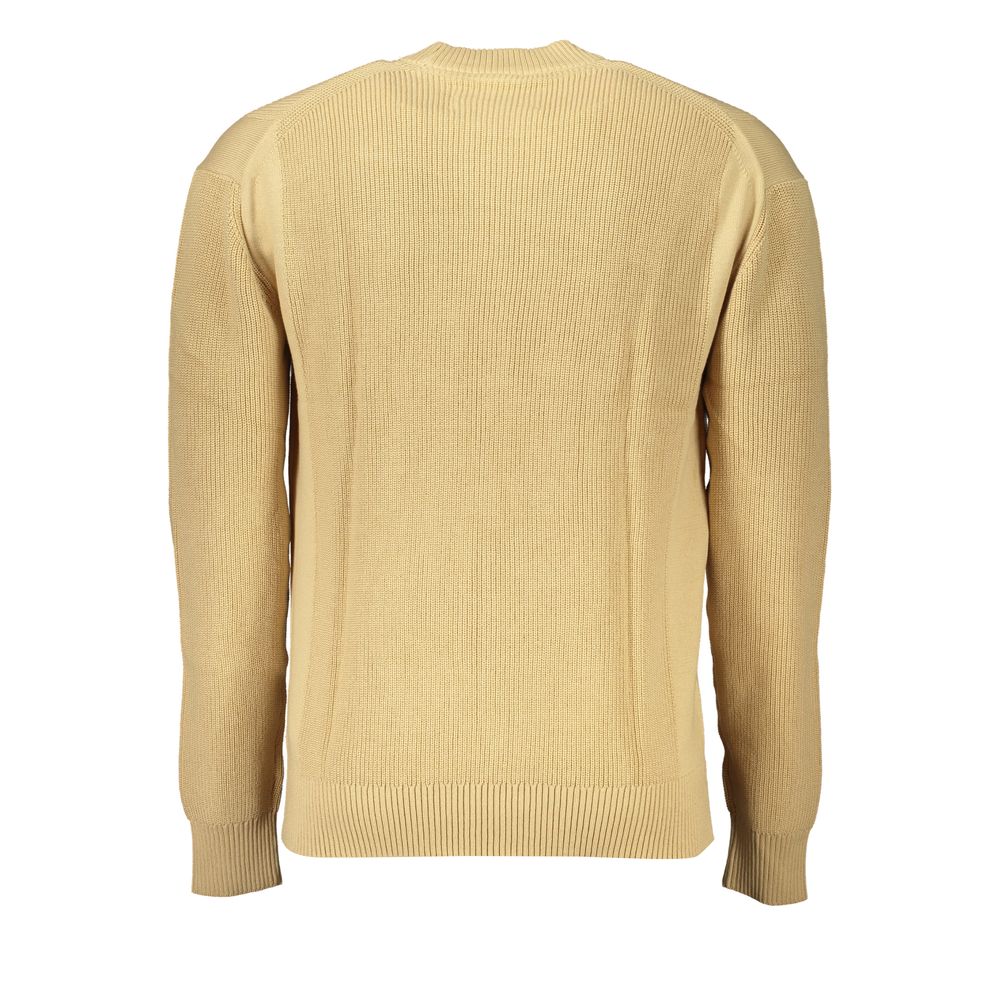 Calvin Klein beige cotton men's sweater displayed on a hanger with a ribbed collar and cuffs.