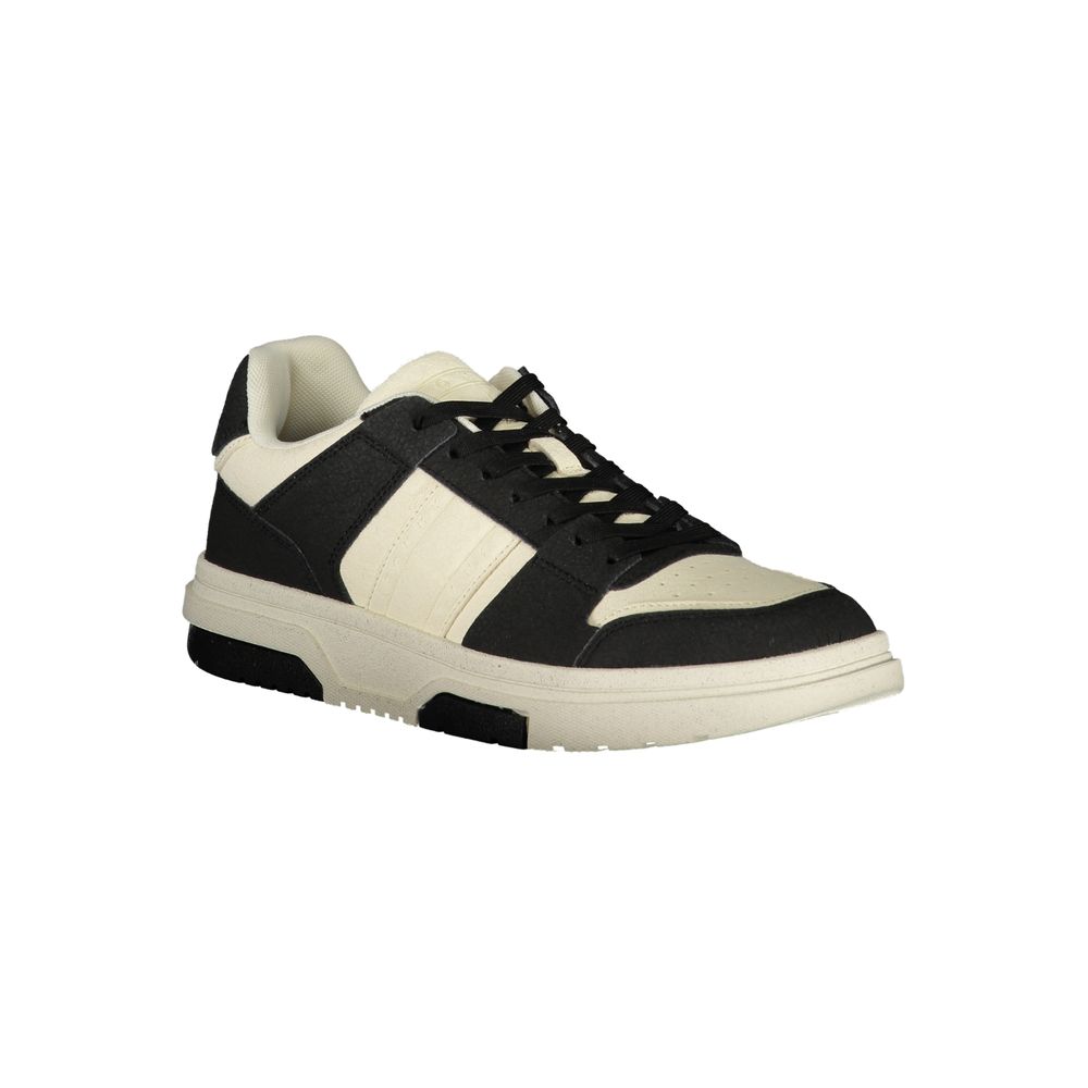 Black Tommy Hilfiger men's sneaker made of polyester, featuring casual athletic design and white sole details.