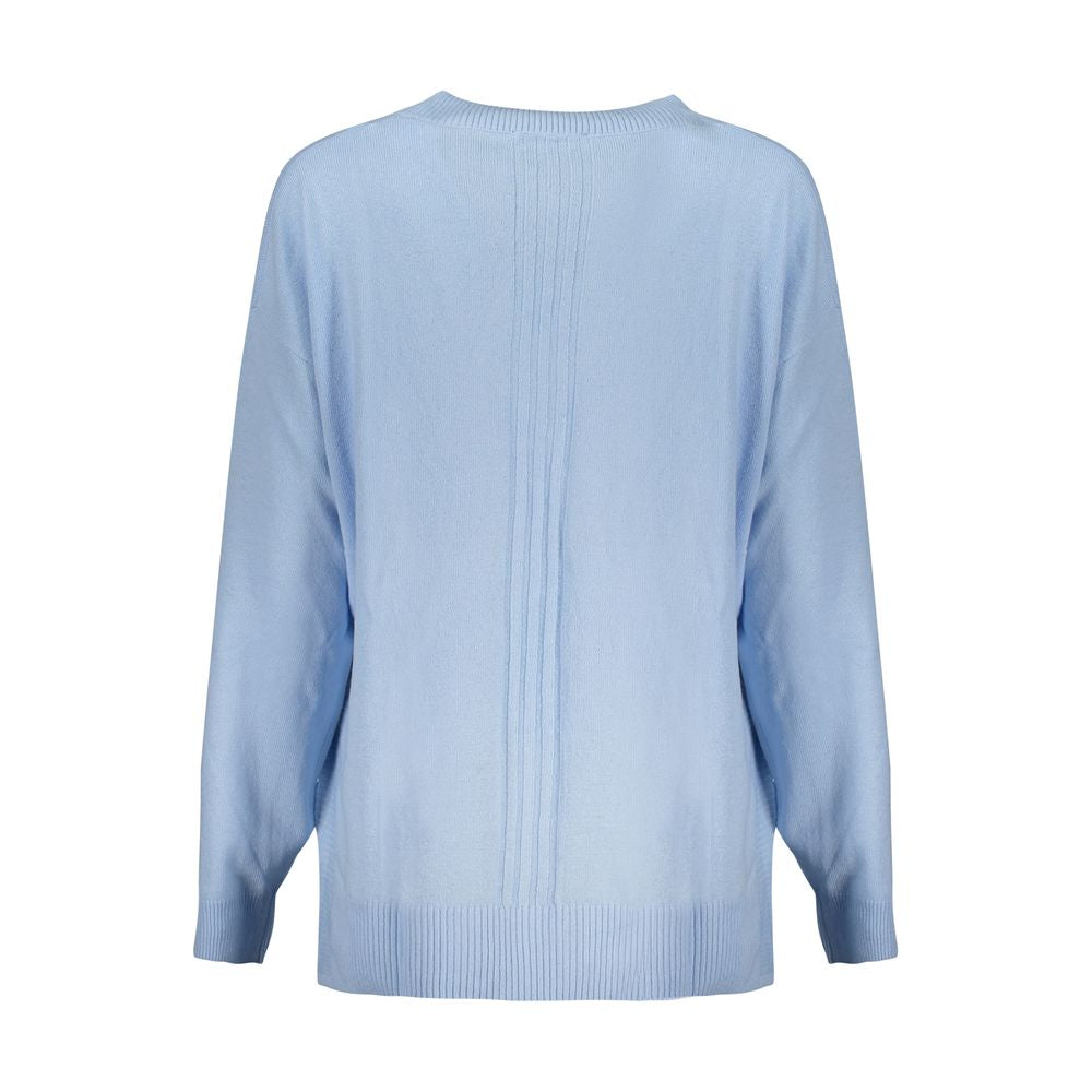 Guess Jeans Azzurro acrylic women's sweater with a cozy knit design and long sleeves, displayed on a hanger.