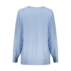 Guess Jeans Azzurro acrylic women's sweater with a cozy knit design and long sleeves, displayed on a hanger.