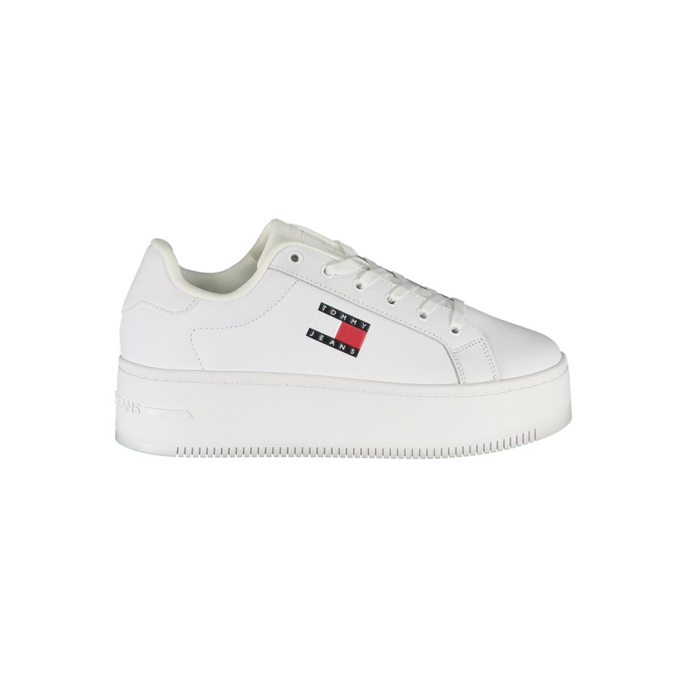 White leather women’s sneaker by Tommy Hilfiger featuring a sleek design and classic branding on the side.
