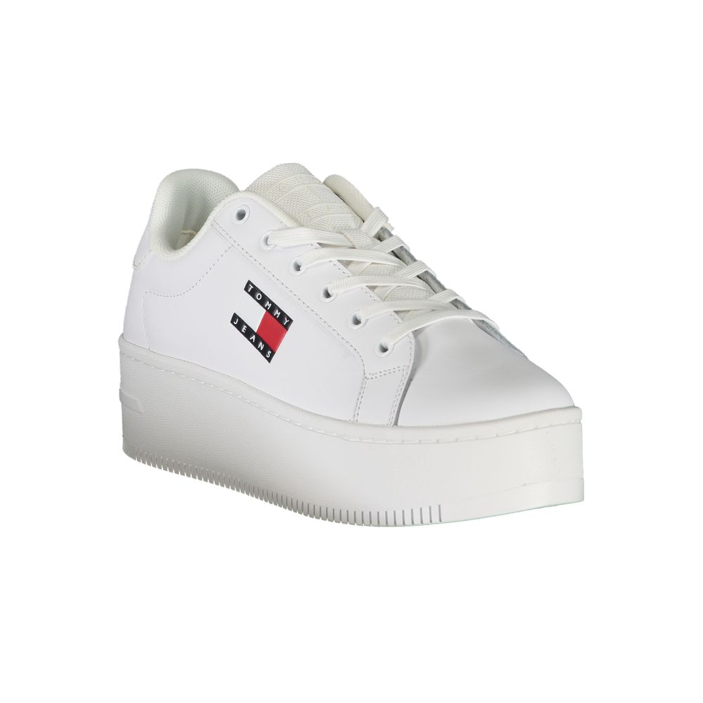 White leather women’s sneaker by Tommy Hilfiger with a sleek design and branded accents on a clean background.