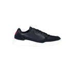 Tommy Hilfiger blue leather men's sneaker with white sole and logo detail, stylish casual footwear.