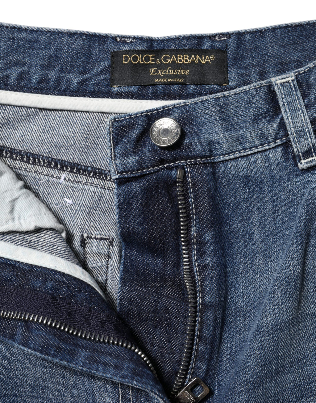 Dolce & Gabbana blue cotton high waist wide-leg denim jeans displayed on a hanger.