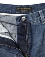 Dolce & Gabbana blue cotton high waist wide-leg denim jeans displayed on a hanger.