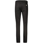 Black Guess Jeans women's cotton skinny jeans shown on a model, highlighting slim fit and classic denim style.