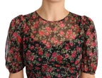 Dolce & Gabbana black floral roses A-line shift gown dress with a fitted waist and elegant floral pattern.