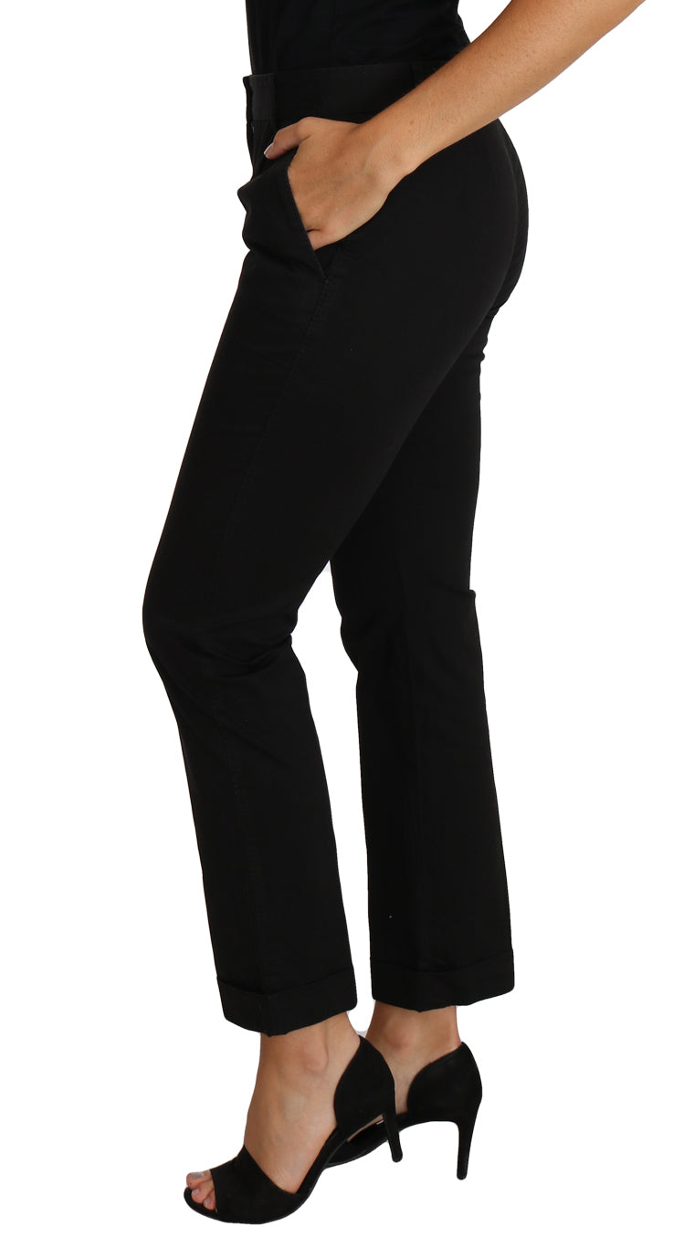 Dolce & Gabbana black cropped straight pants with tailored fit, shown on a model in a fashion photoshoot.