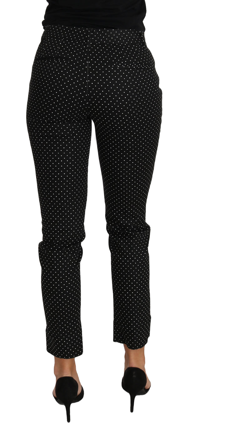 Dolce & Gabbana black polka dot dress with cropped straight pants, stylish and elegant fashion ensemble.