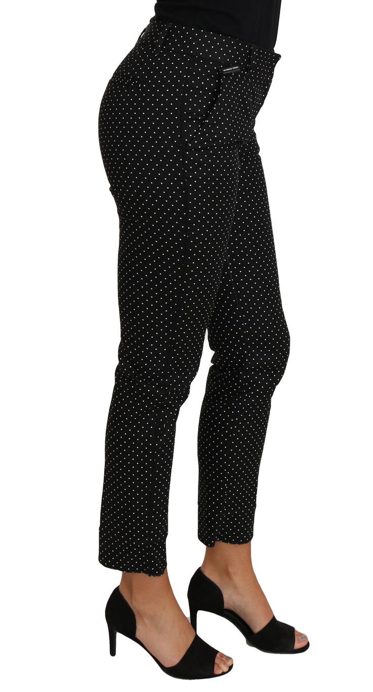 Dolce & Gabbana black polka dot dress and cropped straight pants ensemble, stylish and elegant fashion look.