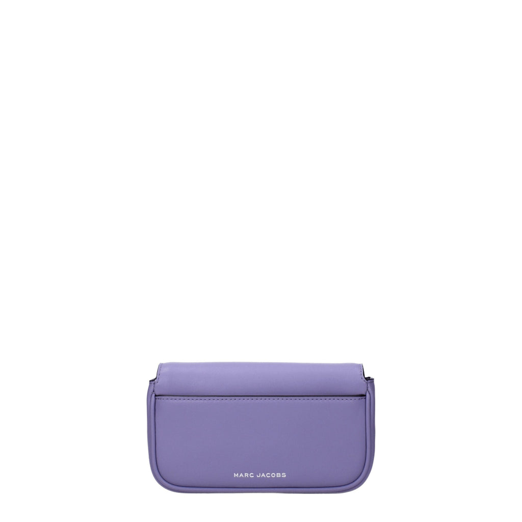 Purple leather crossbody bag by Marc Jacobs with adjustable strap and silver hardware, shown on a plain background.